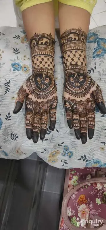 Srinithya Mehendi Designs